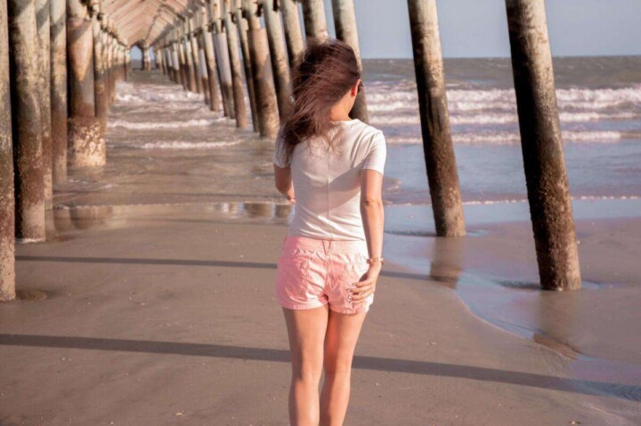 Walking Under Folly Beach Pier