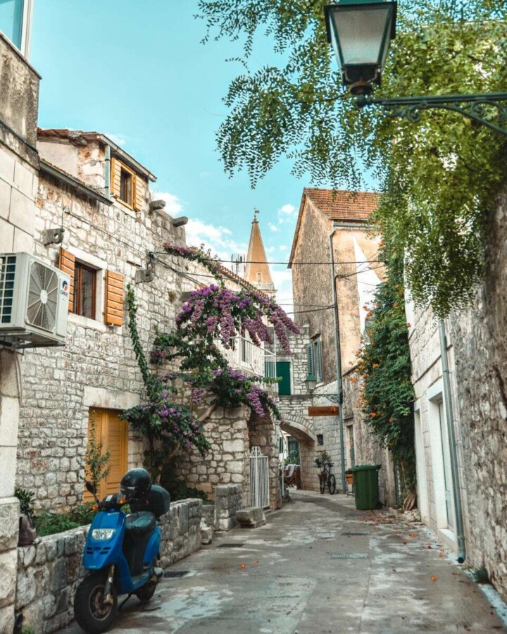 Are you dreaming of visiting Hvar island, Croatia but debating whether to spend more time in Hvar Town or Stari Grad? While these two towns are equally gorgeous, each has its own unique vibe. Fortunately, this guide breaks down everything you need to know about these two popular Hvar towns so that you can build the perfect Hvar itinerary. Discover everything from the key differences, to the top activities, to the best modes of transportation. #starigradhvaroldtown #starigradhvar #hvartowncroatia