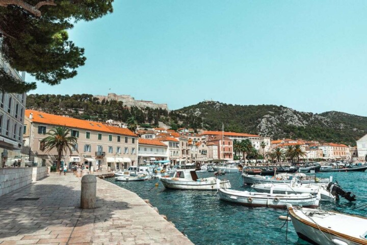 Are you dreaming of visiting Hvar island, Croatia but debating whether to spend more time in Hvar Town or Stari Grad? While these two towns are equally gorgeous, each has its own unique vibe. Fortunately, this guide breaks down everything you need to know about these two popular Hvar towns so that you can build the perfect Hvar itinerary. Discover everything from the key differences, to the top activities, to the best modes of transportation. #starigradhvaroldtown #starigradhvar #hvartowncroatia