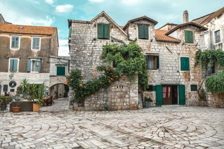 Are you dreaming of visiting Hvar island, Croatia but debating whether to spend more time in Hvar Town or Stari Grad? While these two towns are equally gorgeous, each has its own unique vibe. Fortunately, this guide breaks down everything you need to know about these two popular Hvar towns so that you can build the perfect Hvar itinerary. Discover everything from the key differences, to the top activities, to the best modes of transportation. #starigradhvaroldtown #starigradhvar #hvartowncroatia