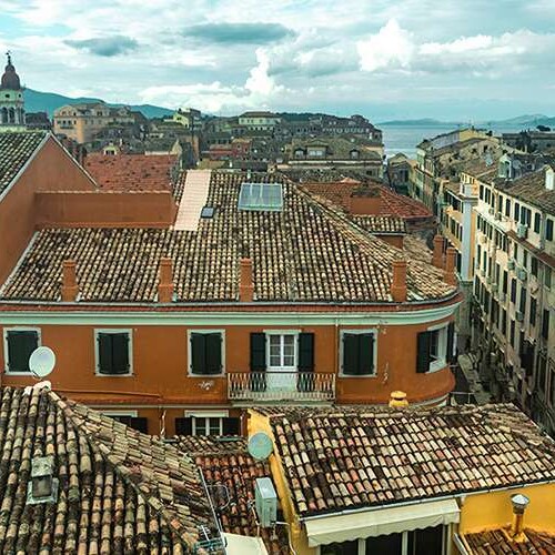 Are you searching for the best boutique hotels in Corfu town? Here are the top Corfu hotels to stay at in the center of the action on this gorgeous Greek island. #besthotelscorfu #corfuoldtown